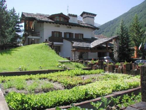 Eco Wellness Hotel Notre Maison Cogne Exterior foto